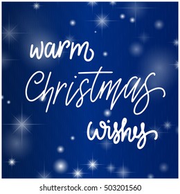 lettering christmas warm wishes on a blue background with stars and twinkling lights