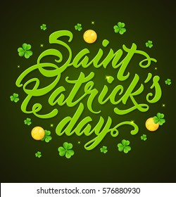 Lettering and clover leaves on a green background. Greeting card for St. Patrick's Day