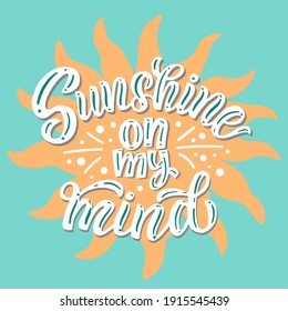 Lettering composition - sunshine on my mind - in vector graphics, on a green background with yellow sun. For the design of postcards, posters, prints on t-shirts, covers, bags.