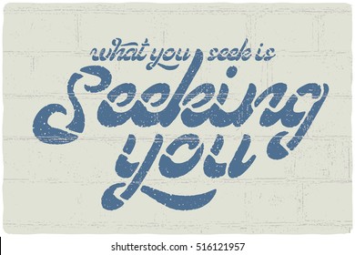 Lettering composition with text quote "What you seek is seeking you"