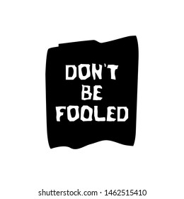 Lettering Don`t be fooled isolated on the black background.Vector hand drawn design element for poster, card or t-shirt. Motivational rule.   
