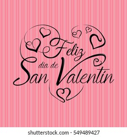 Lettering: Feliz Dia de San Valentin -Happy Valentines Day in Spanish language- in black ink on a pink background - Vector image
