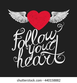Lettering "Follow your heart." Composition with inscription and red winged heart on a dark background. Hand drawing.