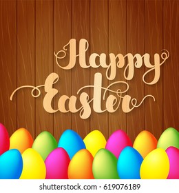 Lettering "Happy Easter" on wooden background. Vector illustration for posters, banners, flyers, stickers, greeting cards and more. Vector illustration. EPS10.