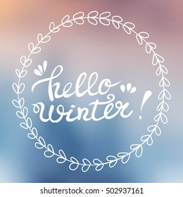 Lettering Hello Winter . hand drawing font. Twisted inscription. Individual letters. white font, blue blur background