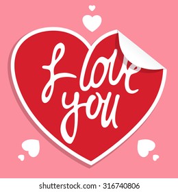 Lettering "I love you" in the shape of a heart.