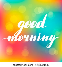 Lettering inscription good morning. Vector lettering on blurred lights background.