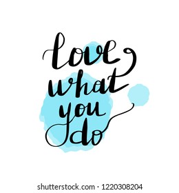 Lettering inscription love what you do. Blue watercolor stain on background.