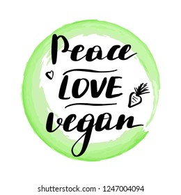 Lettering inscription peace love vegan. Vegan quote. Watercolor stain on background.