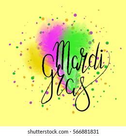 Lettering Mardi Gras with green, yellow and purple ostrich feathers. Vector. Carnival.