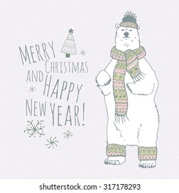 The lettering - MERRY CHRISTMAS AND HAPPY NEW YEAR.  Hand drawn polar bear and stars. Winter postcard.