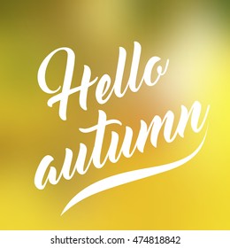 Lettering on blurred background. Hello autumn. Mesh blurred background. Abstract blurred background. 