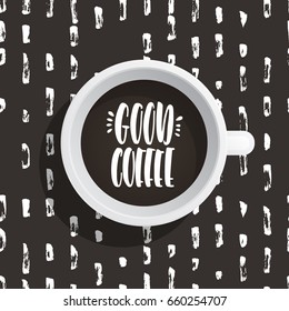 Lettering on the theme of coffee is hand-written. The phrase good coffee written on the coffee Cup top view