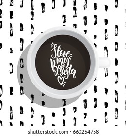 Lettering on the theme of coffee is hand-written. The phrase love my barista written on the coffee Cup top view