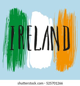 Lettering poster for your design. Creative typography. Hand drawn greeting card with text Ireland. Tourism and travel. Irish flag background. Brush strokes.