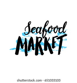 Lettering seafood market, hand drawn with brush pen, inc. Vector. Logo. Could be used for fish market, seafood market.