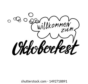 Lettering welcome to Oktoberfest in black color with drops
