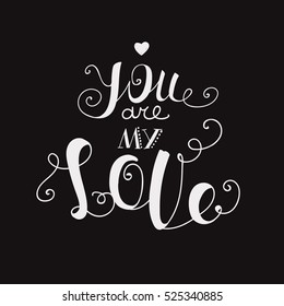Lettering "You are my love." Calligraphic font. Hand drawing. The original design. Vintage style. black background
