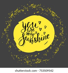 Lettering you are my sunshine. Hand drawn vector illustration, brushpen. Hand lettering quote for Vilentine day cards. Calligraphic inscription. Vector.