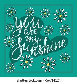 Lettering you are my sunshine. Hand drawn vector illustration, brushpen. Hand lettering quote for Vilentine day cards. Calligraphic inscription. Vector.