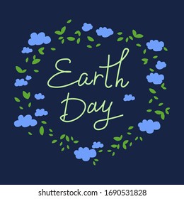 Letterng Earth Day in a circle of clouds and nature