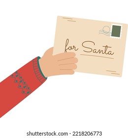 Letters from children for Santa Claus. Hand with Christmas letter.