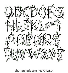 Letters drawn by hand. Letters with flowers. Spring alphabet. The letters of the branches. Line art. Black and white drawing by hand. Stylized. Decorative. Alphabet.