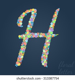 Letters made of leaves and flowers.