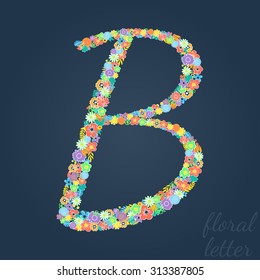 Letters made of leaves and flowers.