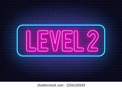 Level 2 neon sign on brick wall background.