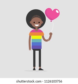 LGBT, LGBTQ+. Young smiling character wearing a rainbow t shirt and holding a heart shape balloon. Flat editable vector illustration, clip art