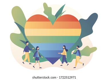  Concepto del movimiento LGBT. Gente pequeña con el corazón de color arcoiris. Desfile de amor.El amor es amor. Estilo moderno de caricatura plana. Ilustración del vector sobre fondo blanco