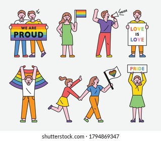 LGBT people are holding rainbow flags and pickets. flat design style minimal vector illustration.