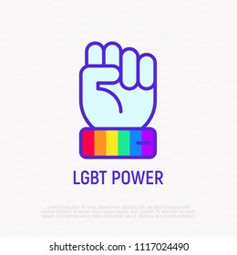LGBT power thin line icon: hand with rainbow wristband. Modern vector illustration.