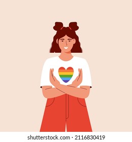 LGBT pride month. Smiling trendy woman embrace lgbt heart. Woman support lgbt community. Pride month celebration against violence, discrimination, human rights.Isolated on white. Banner