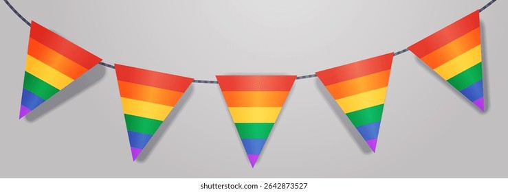 LGBT pride rainbow bunting festive celebration flags colorful triangular pennants hanging on string with light gray background party decoration