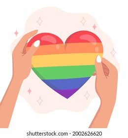 Símbolo del corazón del orgullo Lgbtqi en las manos