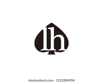 The lh initials logo inside the black shovel