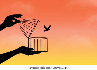 Liberation symbol. Birds flying out of cage, freedom concept, bird set free, a bird flying for freedom from an open cage.