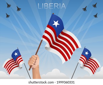 Liberian flags fluttering under the blue sky