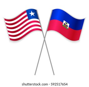 Liberian and Haitian crossed flags. Liberia combined with Haiti isolated on white. Language learning, international business or travel concept.