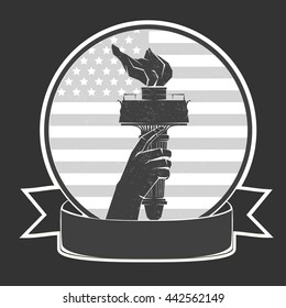 Liberty statue hand with torch black and white emblem in a circle and ribbon beneath on the united states flag with star and stripe background for July fourth day signs and posters vector illustration