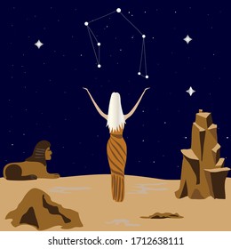 Libra stands in the desert under the starry sky. Constellation libra. Zodiac.