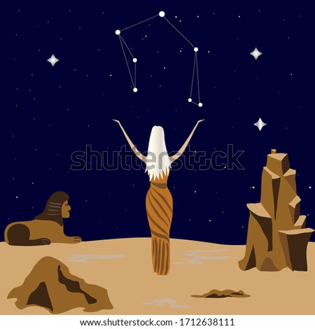 Libra stands in the desert under the starry sky. Constellation libra. Zodiac.