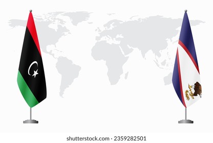 Libya and American Samoa flags for official meeting against background of world map.