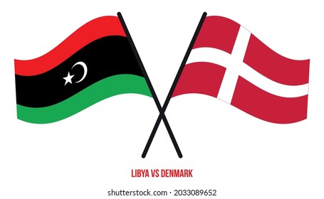 Libya and Denmark Flags Crossed And Waving Flat Style. Official Proportion. Correct Colors.