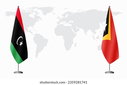 Libya and East Timor flags for official meeting against background of world map.