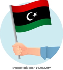 libya flag in hand. Patriotic background. National flag of libya vector illustration