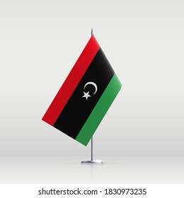 Libya flag state symbol isolated on background national banner. Greeting card National Independence Day of the State of Libya. Illustration banner with realistic state flag.