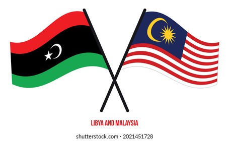 Libya and Malaysia Flags Crossed And Waving Flat Style. Official Proportion. Correct Colors.